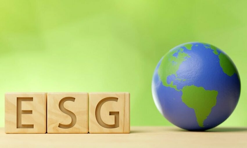 The letters "ESG" spelled out in blocks with a globe next to them.